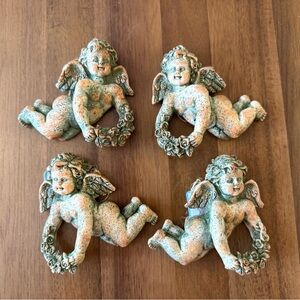 Set of Four Cherub Ornaments or napkin holders